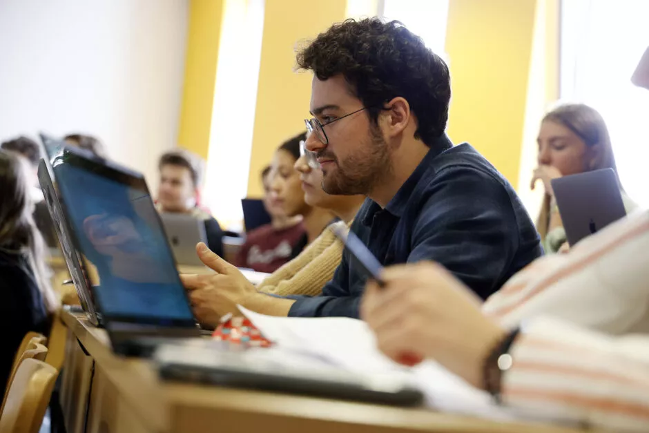 Student with a computer
